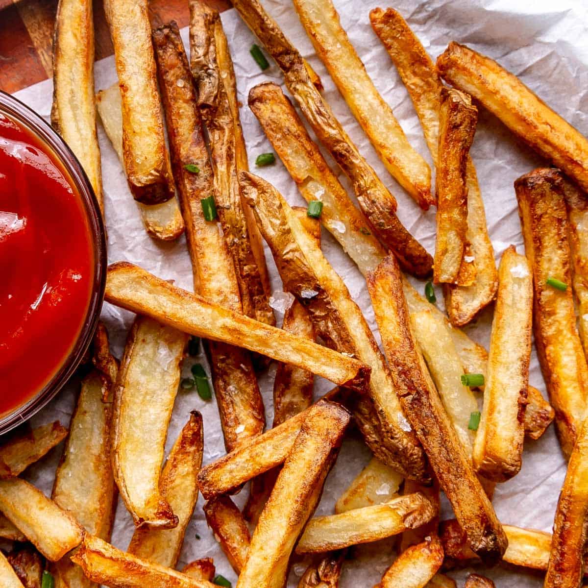 Close up of french fries with ketchup.