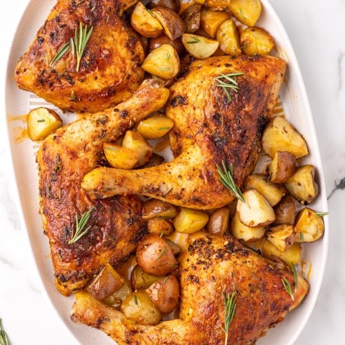 Rosemary Garlic Chicken Quarters on a serving platter