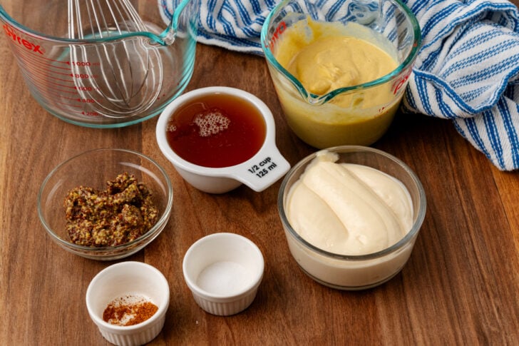Ingredients - dijon mustard, mayonnaise, honey, whole grain mustard, salt and pepper for honey mustard recipe.